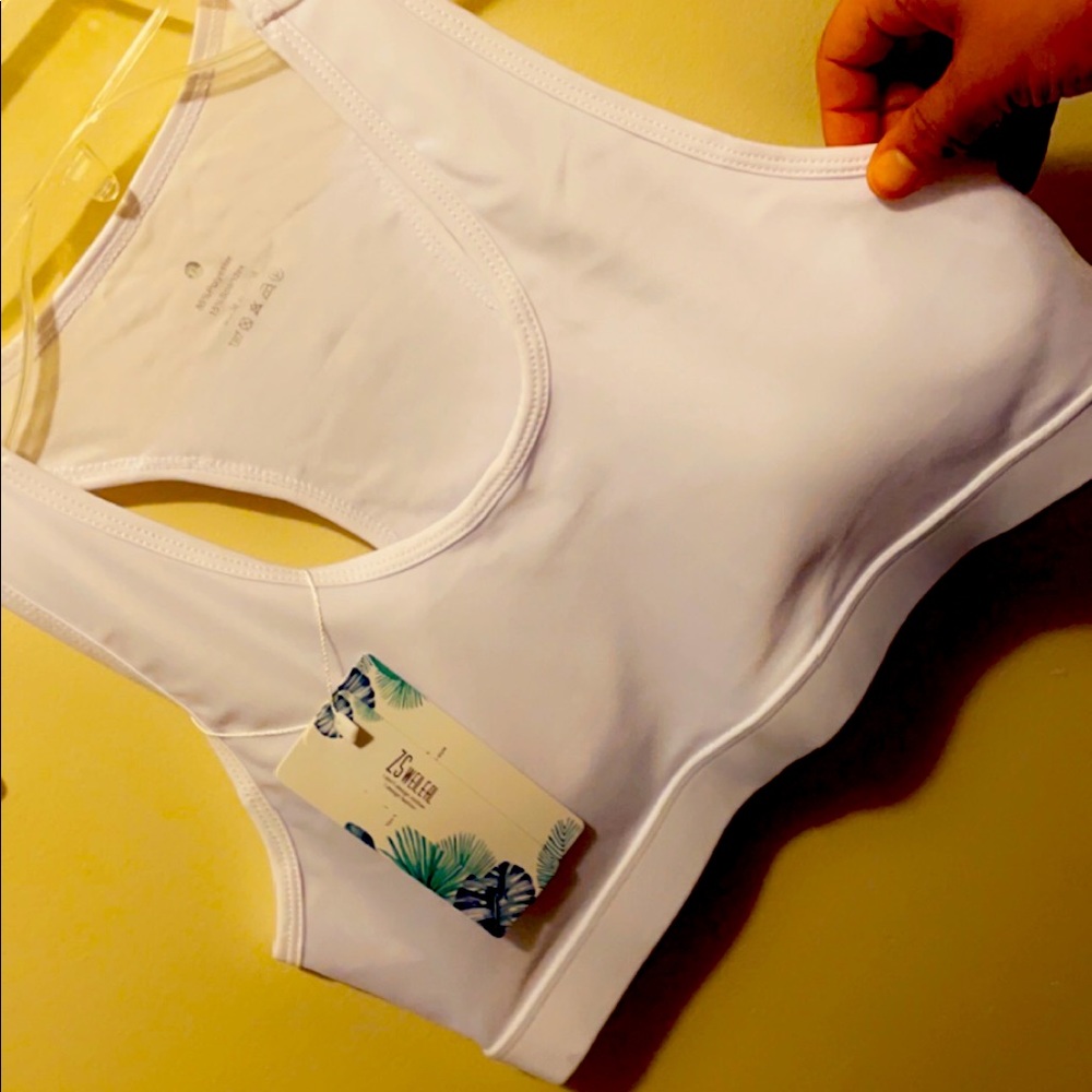 Sports bras with cell phone pocket in back!